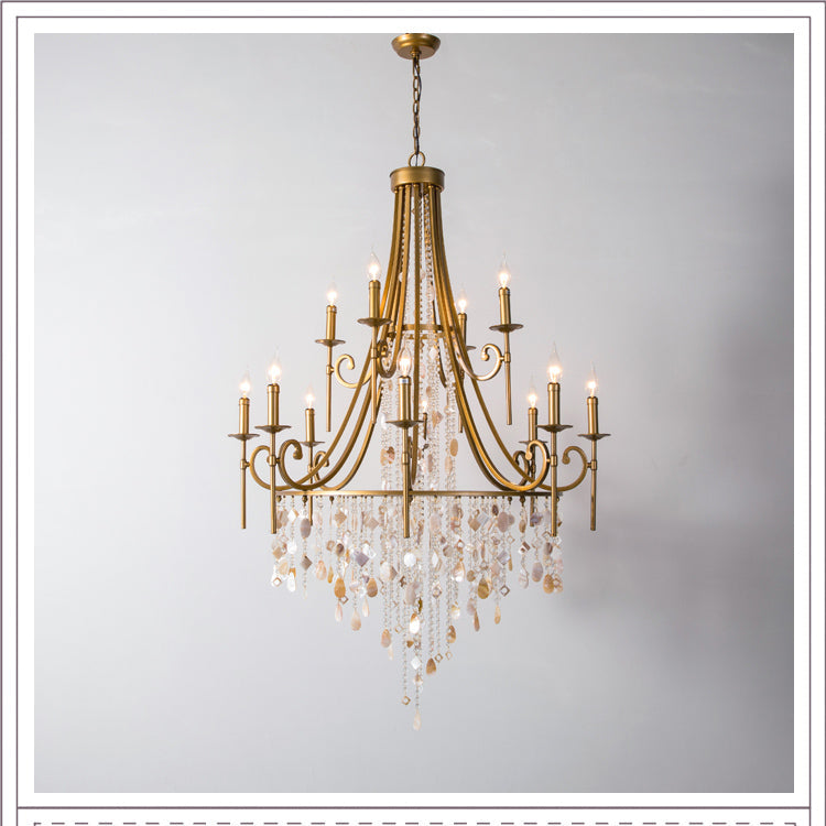 The Clérachic Trove in brass in a taller proportion, the alabaster cascade narrowing to a fine point.