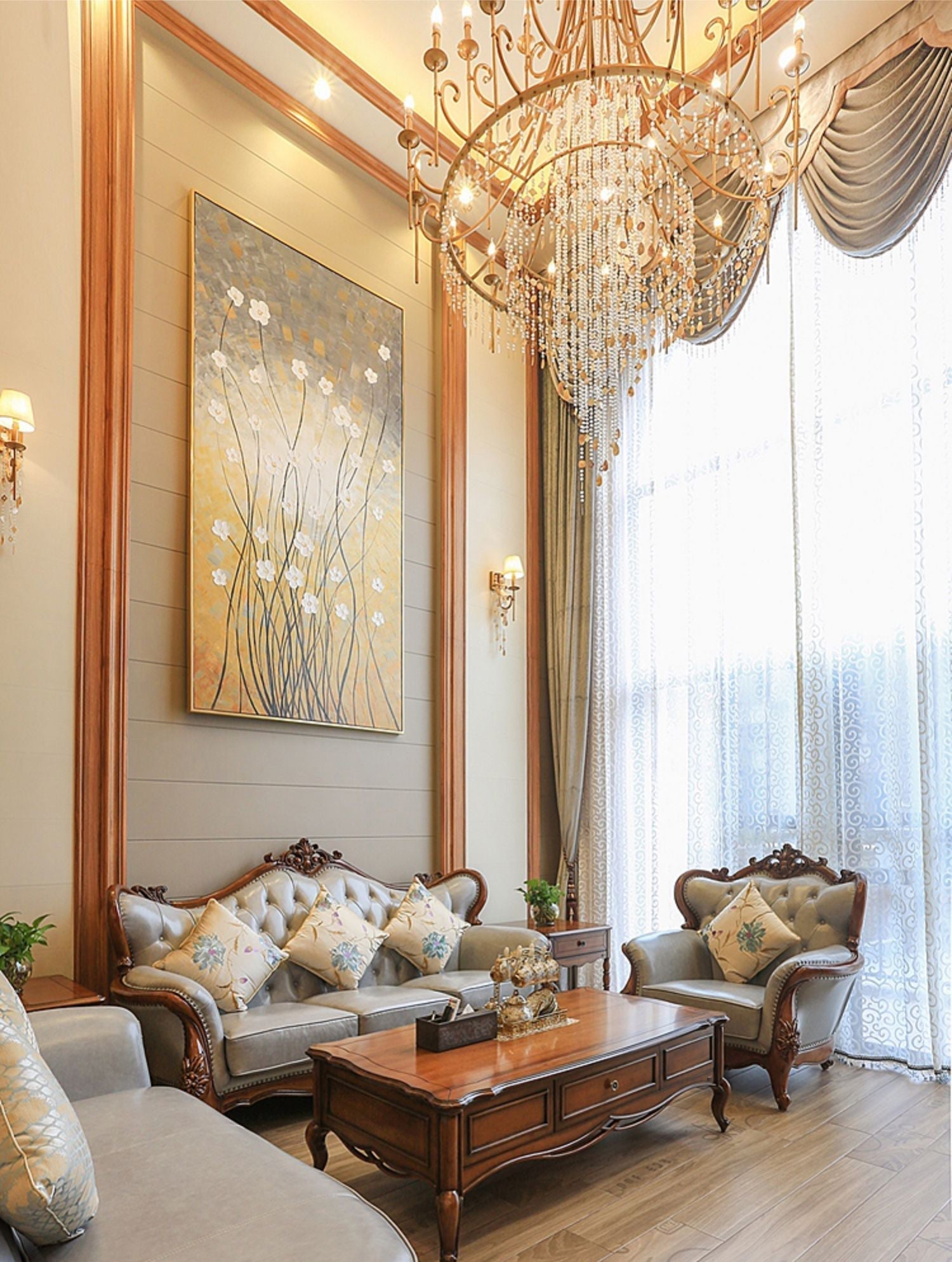 Clérachic Trove in brass over a classic living room, its light warming draped curtains and framed art.