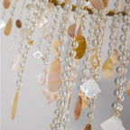 The Clérachic Trove's cascade up close: honey-toned alabaster slices strung with round crystal beads.