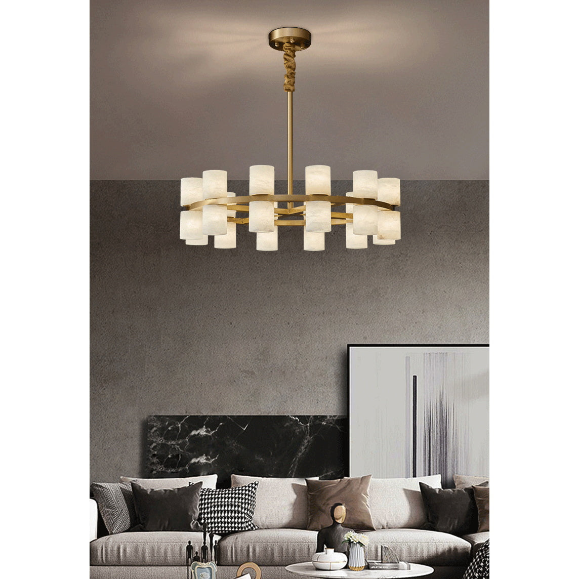 The Clérachic Two-Ring Chandelier hung over a neutral living room, unlit shades reading milky against a taupe wall.