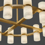 Underside of the Clérachic Two-Ring Chandelier, showing the flat brass straps crossing into the small central hub.