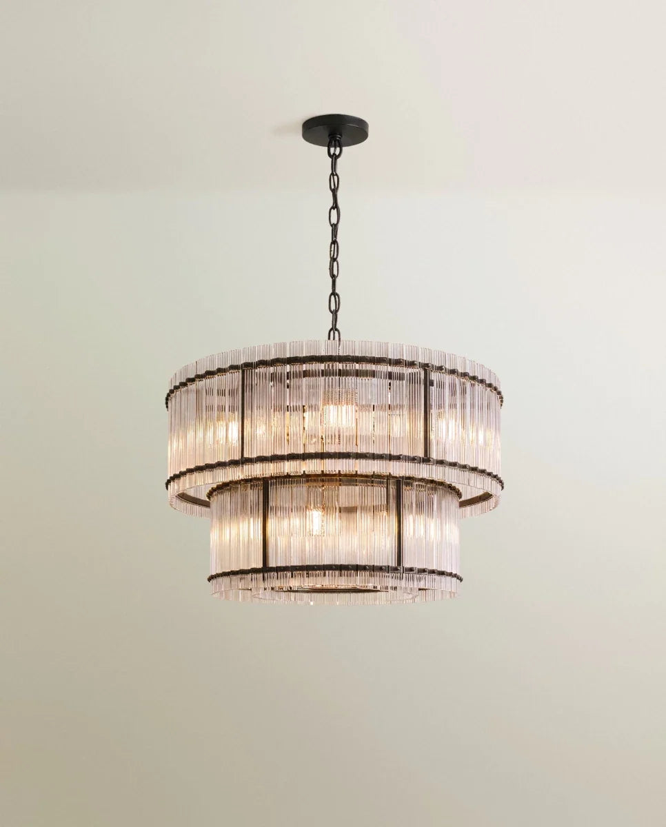 Clérachic mid-size two-tier chandelier in matte black with fluted glass rods and slim black uprights, hung from a chain.