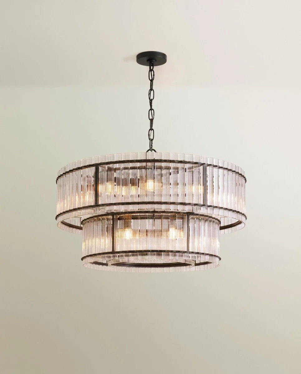 Clérachic wide two-tier chandelier in matte black, a broad upper ring and a smaller lower ring of fluted clear glass.