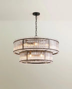 Clérachic wide two-tier chandelier in matte black, a broad upper ring and a smaller lower ring of fluted clear glass.