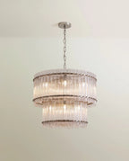 Clérachic two-tier chandelier in polished nickel with a bright silver chain, canopy and fluted clear glass rods.