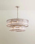Clérachic wide two-tier chandelier in polished nickel with a broad upper ring and fluted clear glass rods on a silver chain.