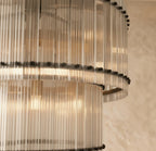 Clérachic close view of fluted clear glass rods and black studs on the two tiers of the matte black chandelier.