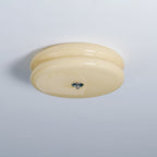 Side profile of the Clérachic two-tier flush mount ceiling light showing both stacked glass tiers and the chrome finial.