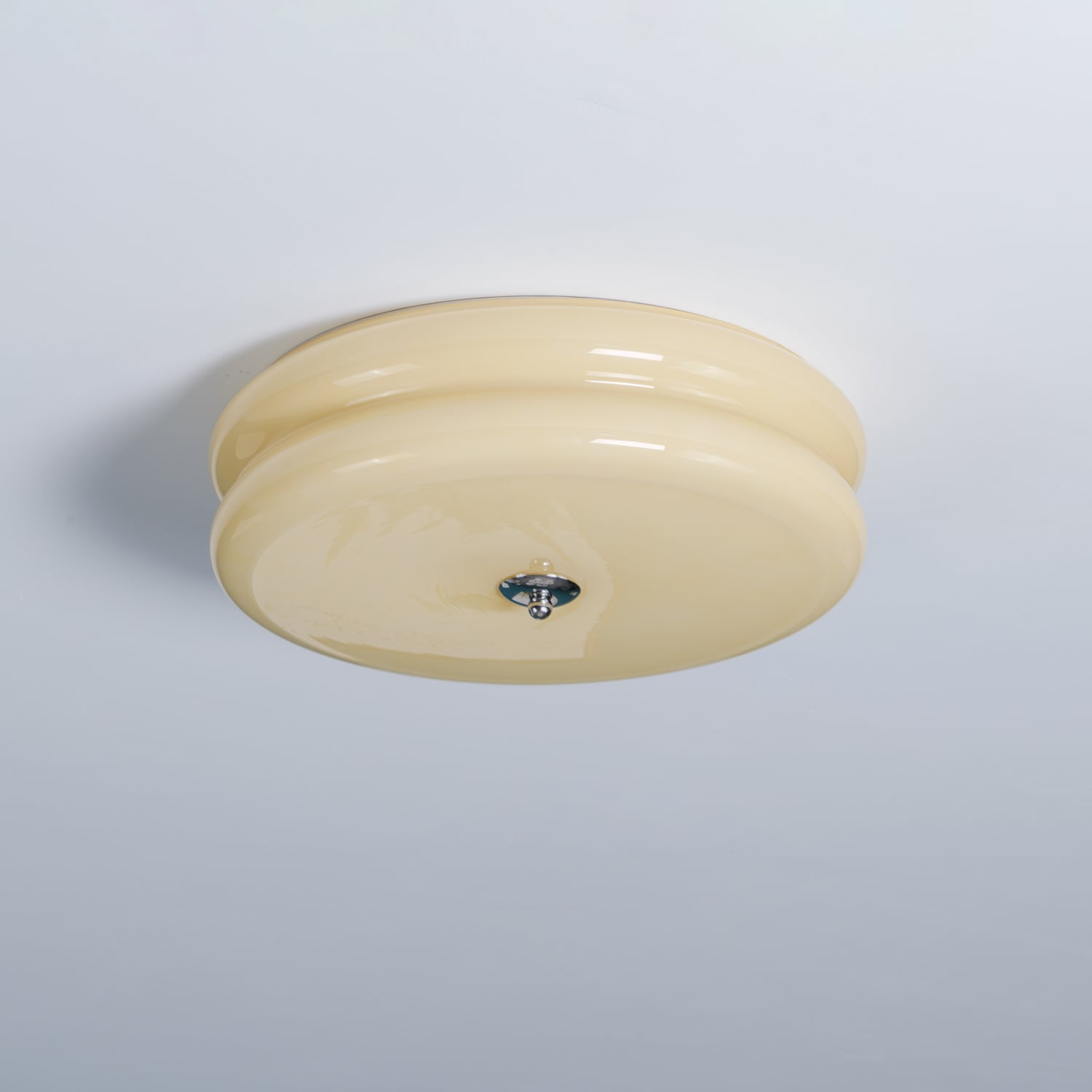 Side profile of the Clérachic two-tier flush mount ceiling light showing both stacked glass tiers and the chrome finial.