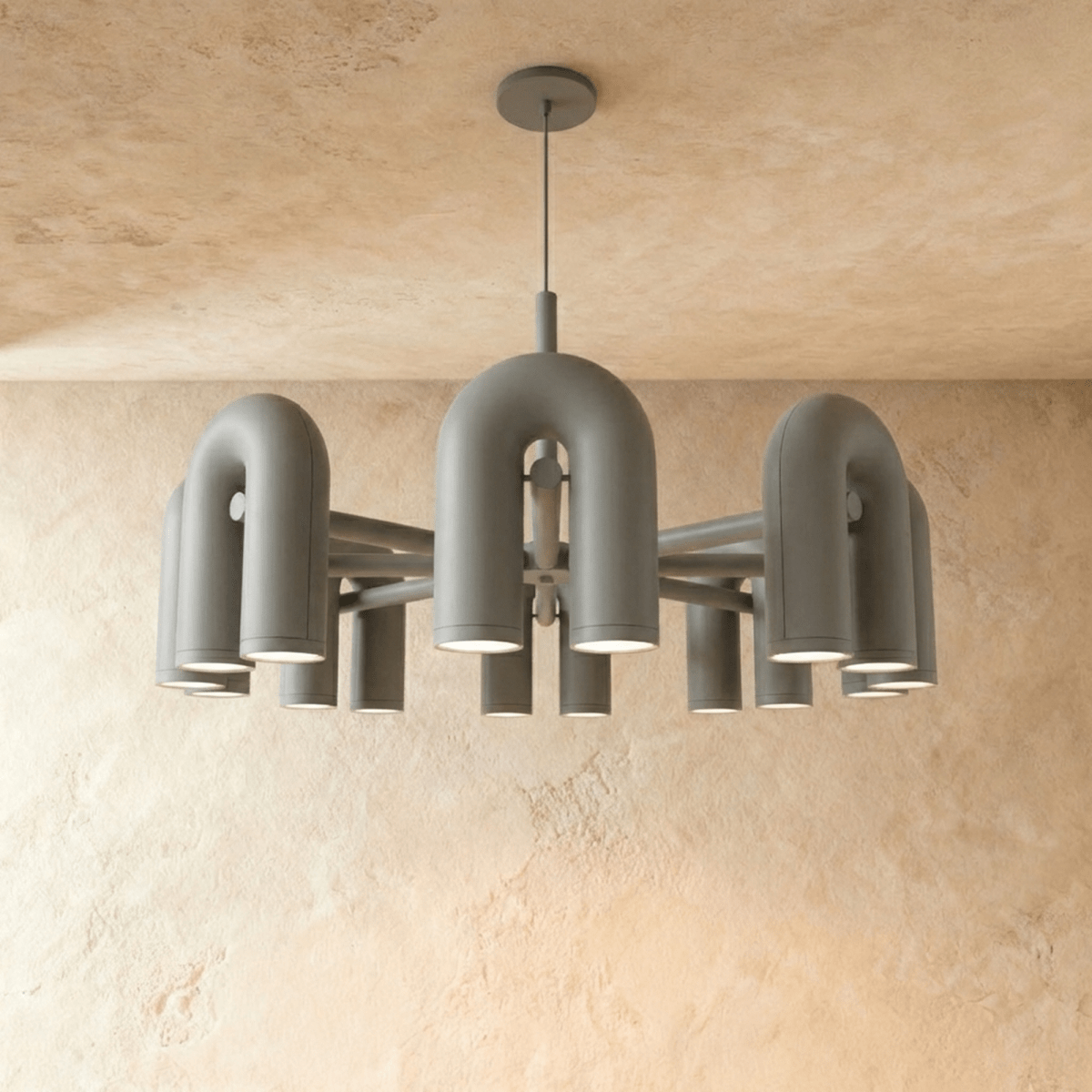 Clérachic widest chandelier in grey, a full ring of U-shaped arch modules with downlights, hung from a round ceiling plate.