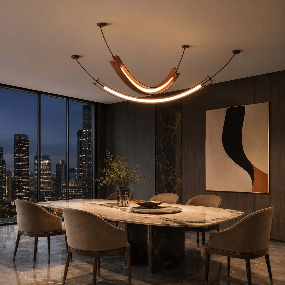 A Clérachic pendant with a terracotta U-shaped curve, and a longer slim strip light beneath it, over a stone table at dusk.