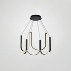 Clérachic looped arm pendant on grey, lit and angled to show the black outer faces.