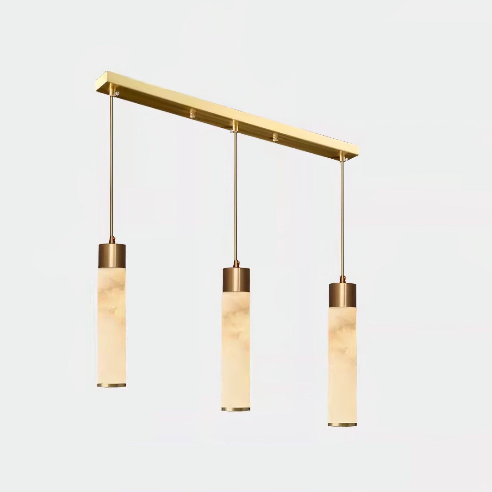 The Clérachic long-canopy option lines three alabaster cylinders along a linear brushed brass bar.