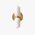 Clérachic Up-and-Down Opal Wall Sconce in brushed gold, two opal glass shades on a round backplate, shown unlit.