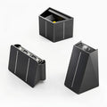 Clérachic black solar wall lights shown in three forms: a boxy one, a wide multi-head panel and a tilted wedge.