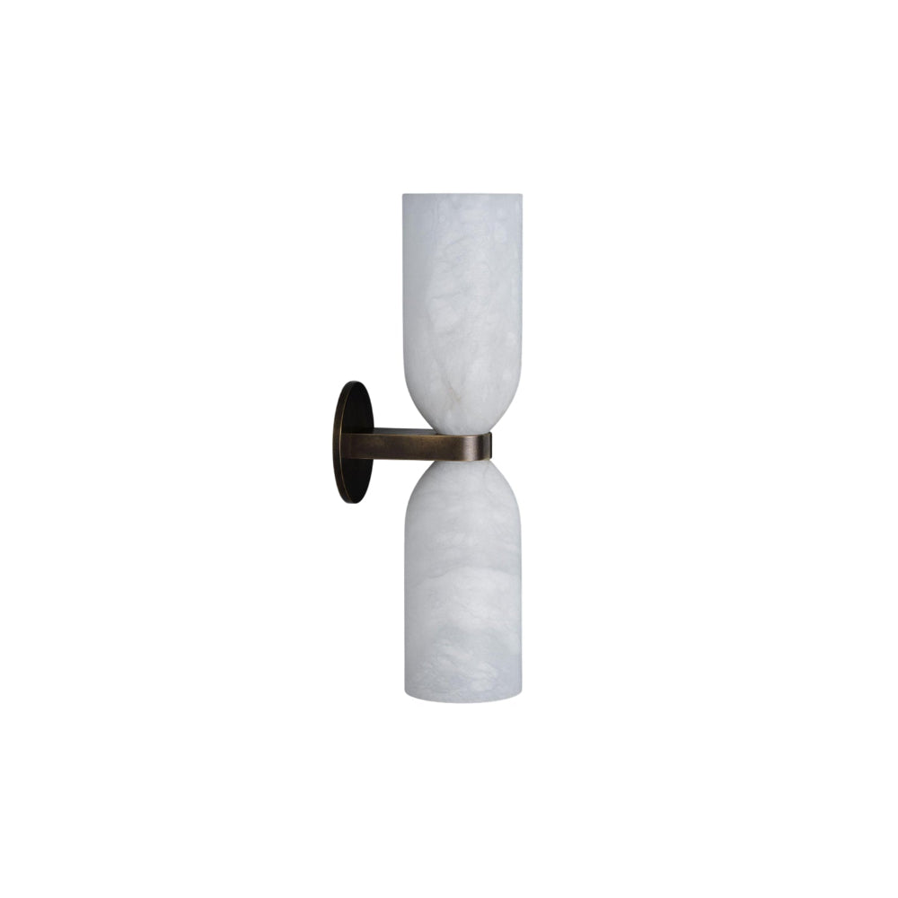Side profile of the Clérachic alabaster wall sconce on white, showing how little the brass arm projects from the round wall plate.