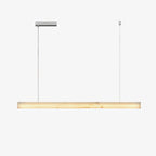 Clérachic Velmore linear pendant on white, a slim alabaster bar suspended on two fine cables.