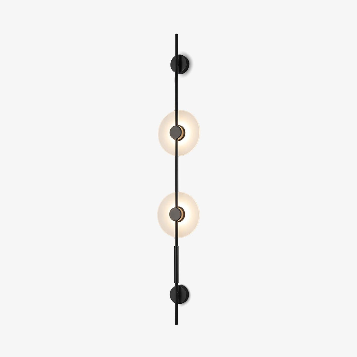 Front view of this Clérachic vertical wall sconce in black on a white backdrop, with two glowing alabaster discs on a slim upright rod.