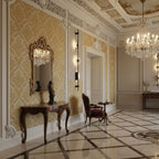 Tall black Clérachic sconce lit on a gold damask wall in a grand hall, with a gilt mirror, carved console and crystal chandelier.