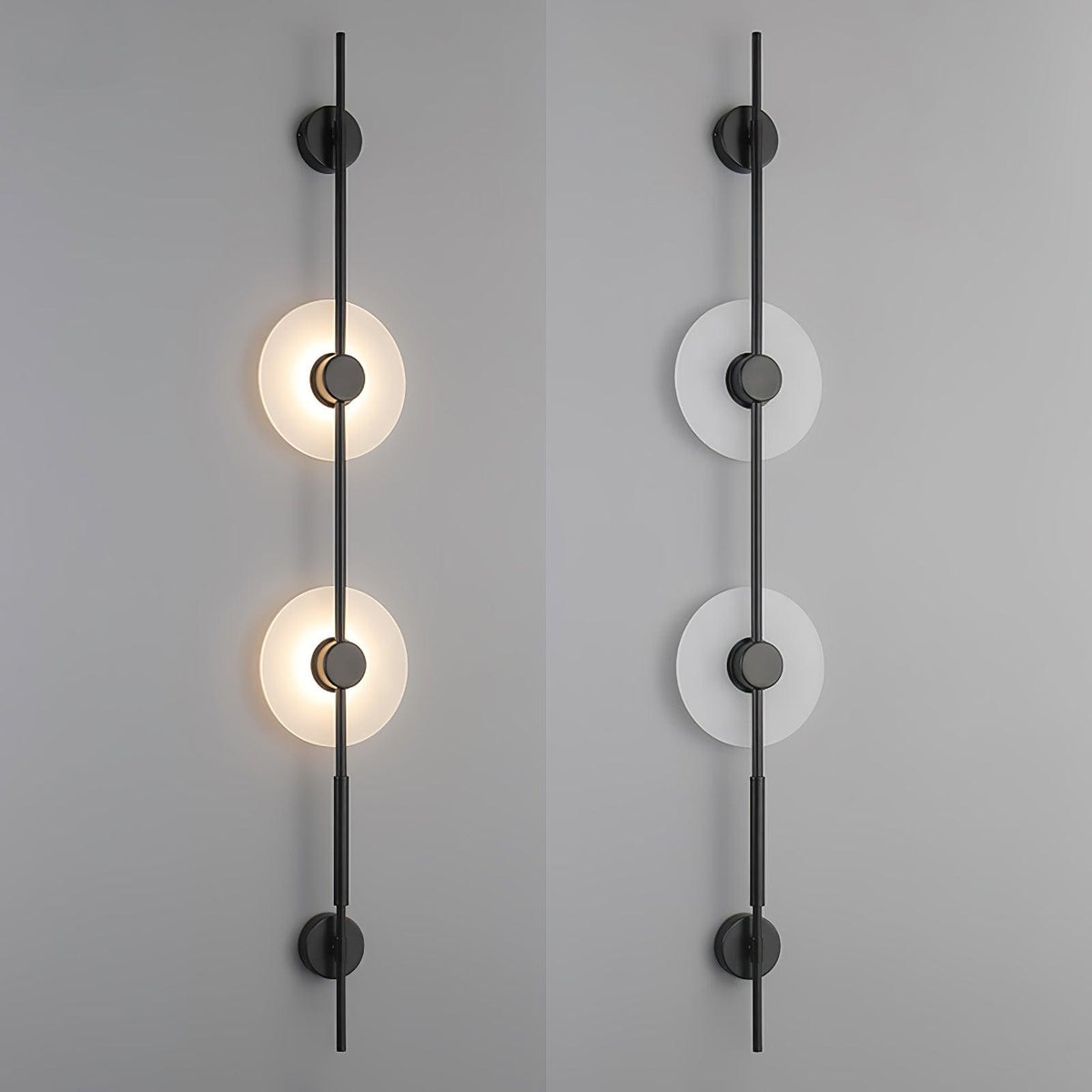 Two black Clérachic sconces side by side on a grey wall, the left lit and the right unlit, each with two alabaster discs.