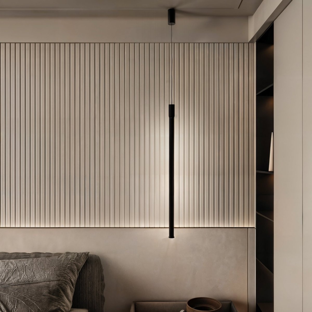 A Clérachic black rod pendant lights a fluted wood headboard panel beside an open bedroom storage nook.