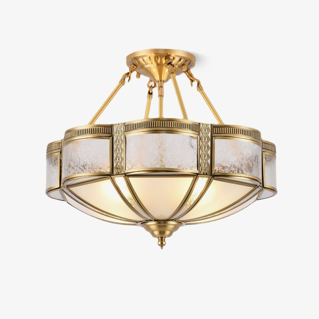 This Clérachic semi-flush light on a white backdrop, with slim brass arms, a textured glass band and a frosted bowl.