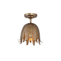 Vintage gold Clérachic ceiling light on a plain white background, its layered metal petals curling out below a round canopy.