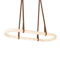 The Clérachic Vista ring shown unlit from a low angle, the stitched faux-leather hangers splaying wide above the stone.