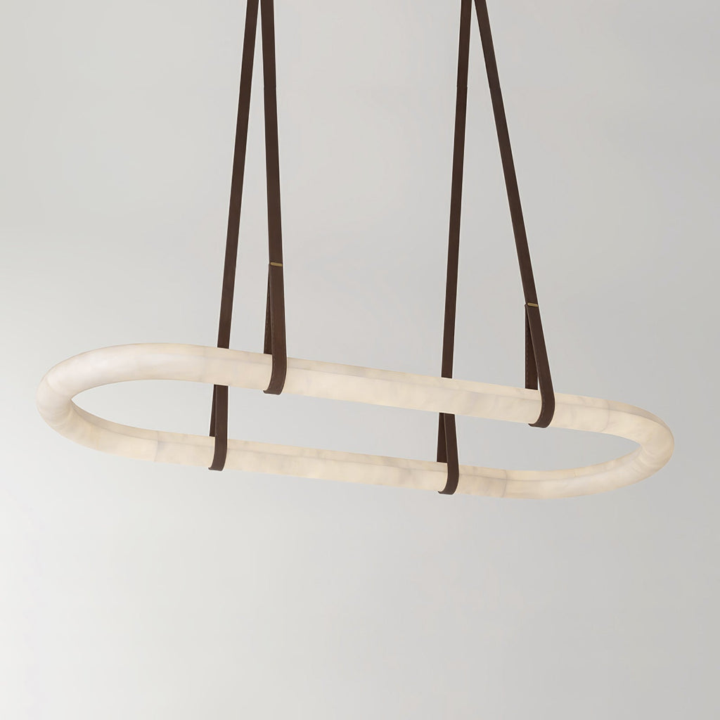 The Clérachic Vista unlit on grey, showing the natural cream and amber veining running through the alabaster.