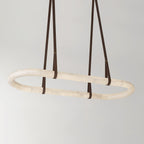 The Clérachic Vista unlit on grey, showing the natural cream and amber veining running through the alabaster.