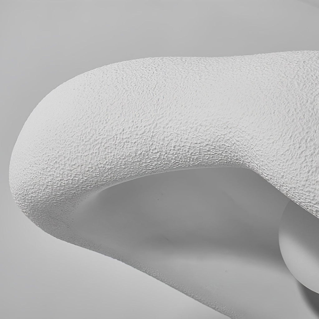 Close view of the rough, pitted surface on the rolled edge of this Clérachic white pendant shade.