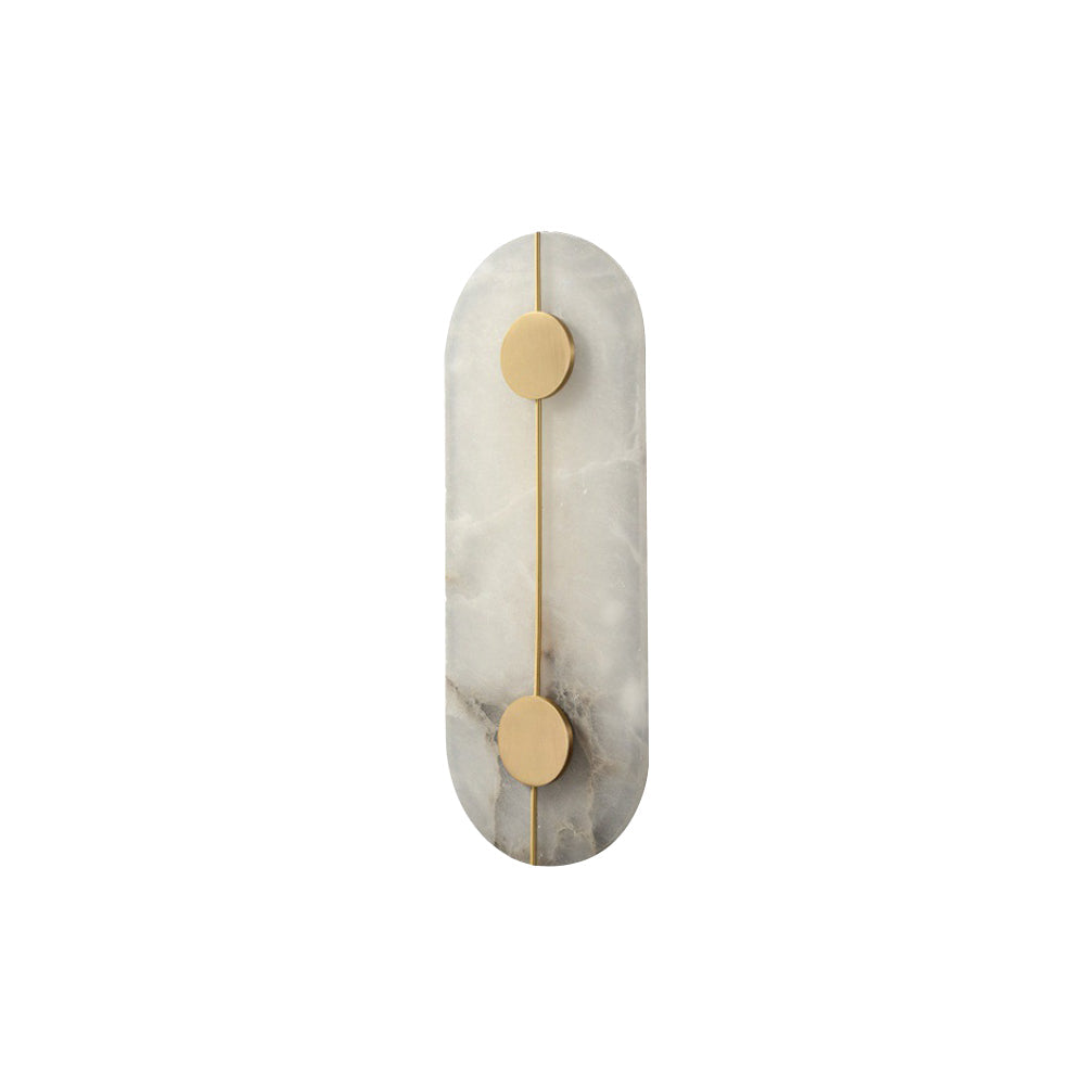 The Clérachic tall alabaster wall lamp unlit on white, showing the pale stone slab and its two brushed brass discs.