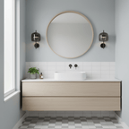 A pair of black Clérachic wall lights with smoke grey glass shades flank a round mirror above a pale oak vanity and a white basin.
