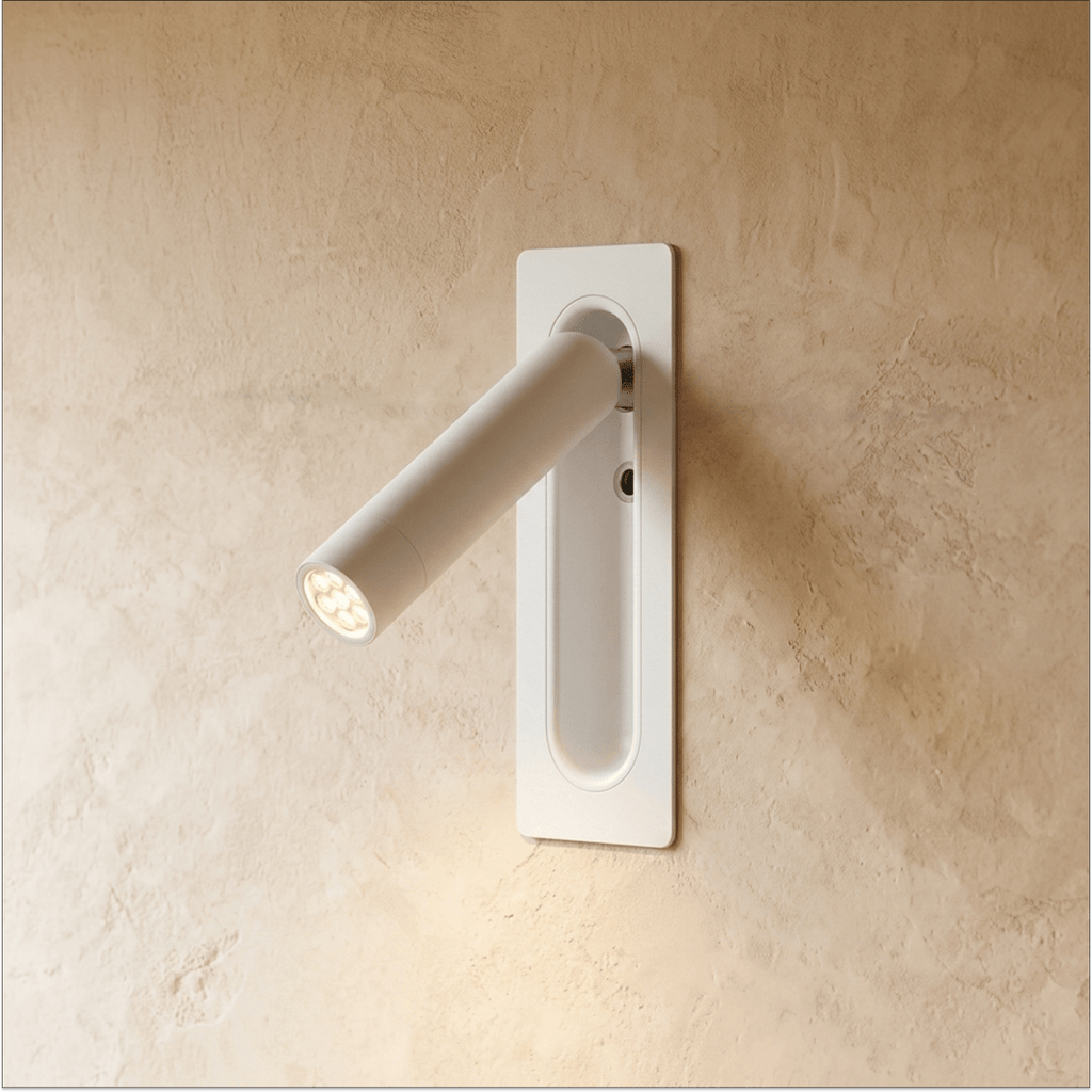 Clérachic slim wall-mounted reading light in white, spotlight arm angled out from a recessed rectangular plate.