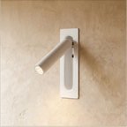 Clérachic slim wall-mounted reading light in white, spotlight arm angled out from a recessed rectangular plate.