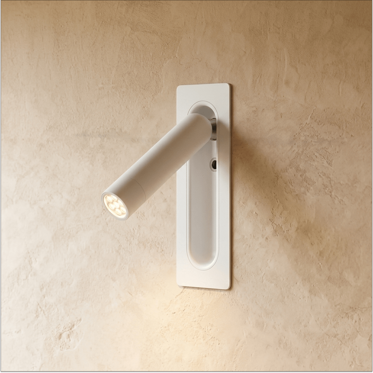 Clérachic slim wall-mounted reading light in white, spotlight arm angled out from a recessed rectangular plate.