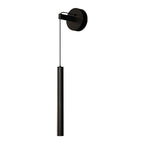 Black wall light with a round backplate and slim black tube, shown large on a white background, from Clérachic.