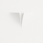 Clérachic white plaster-style wall light unlit, two curved faces meeting at a narrow V-shaped opening on a white wall.