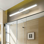 Clérachic white linear wall light with a frosted diffuser above a glass-fronted cabinet in a light timber-lined room.