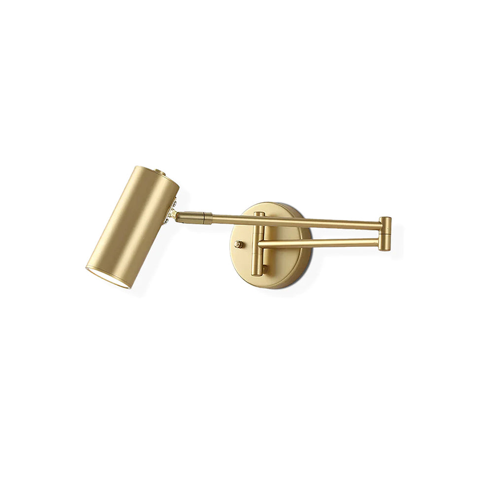 Clérachic gold wall light on a white backdrop, with its arm folded at the elbow and a cylinder head tilted down.