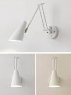 White version of the Clérachic swing-arm wall light with a conical shade and a gold joint, with two smaller views of it below.