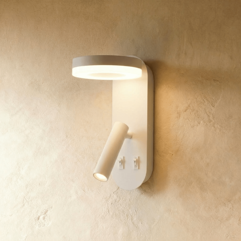 Clérachic white wall reading light with a glowing circular LED ring, an angled tube spotlight and two rocker switches.
