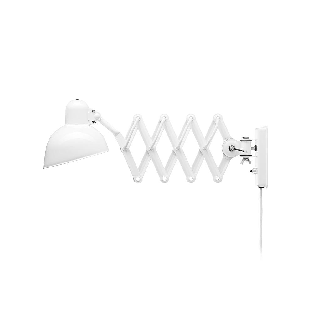 White Clérachic scissor-arm wall light with a domed shade, shown side-on on a plain white background.