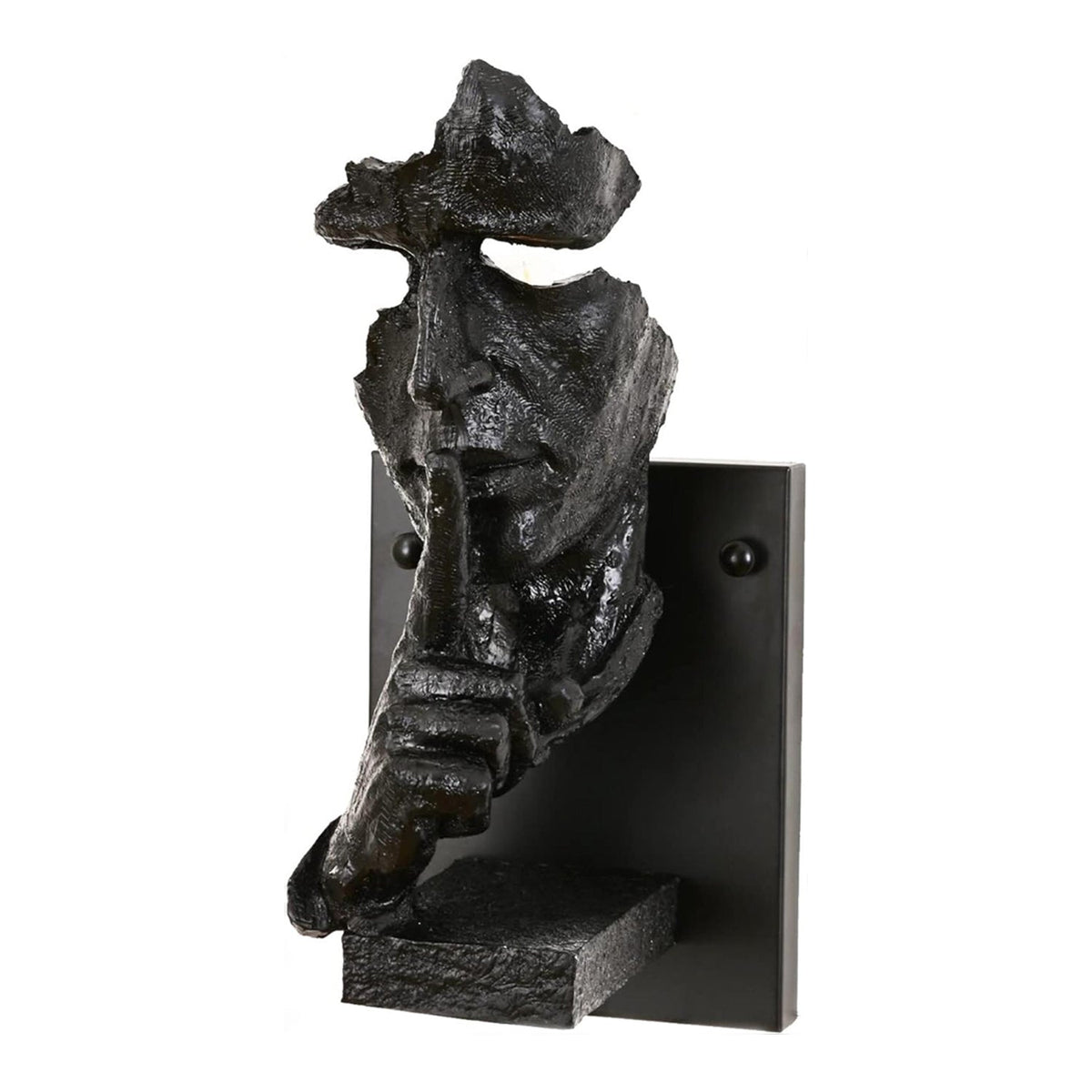 Black Clérachic face wall light photographed on white, showing the rough dark resin surface and the small shelf under the hand.