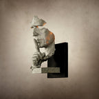 White Clérachic face wall light on a mottled beige backdrop, shown from a slight angle with its black plate behind.