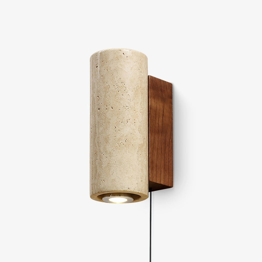 Cylindrical travertine wall light from Clérachic with a walnut-colour wooden backplate and a downlight, shown on a white backdrop.