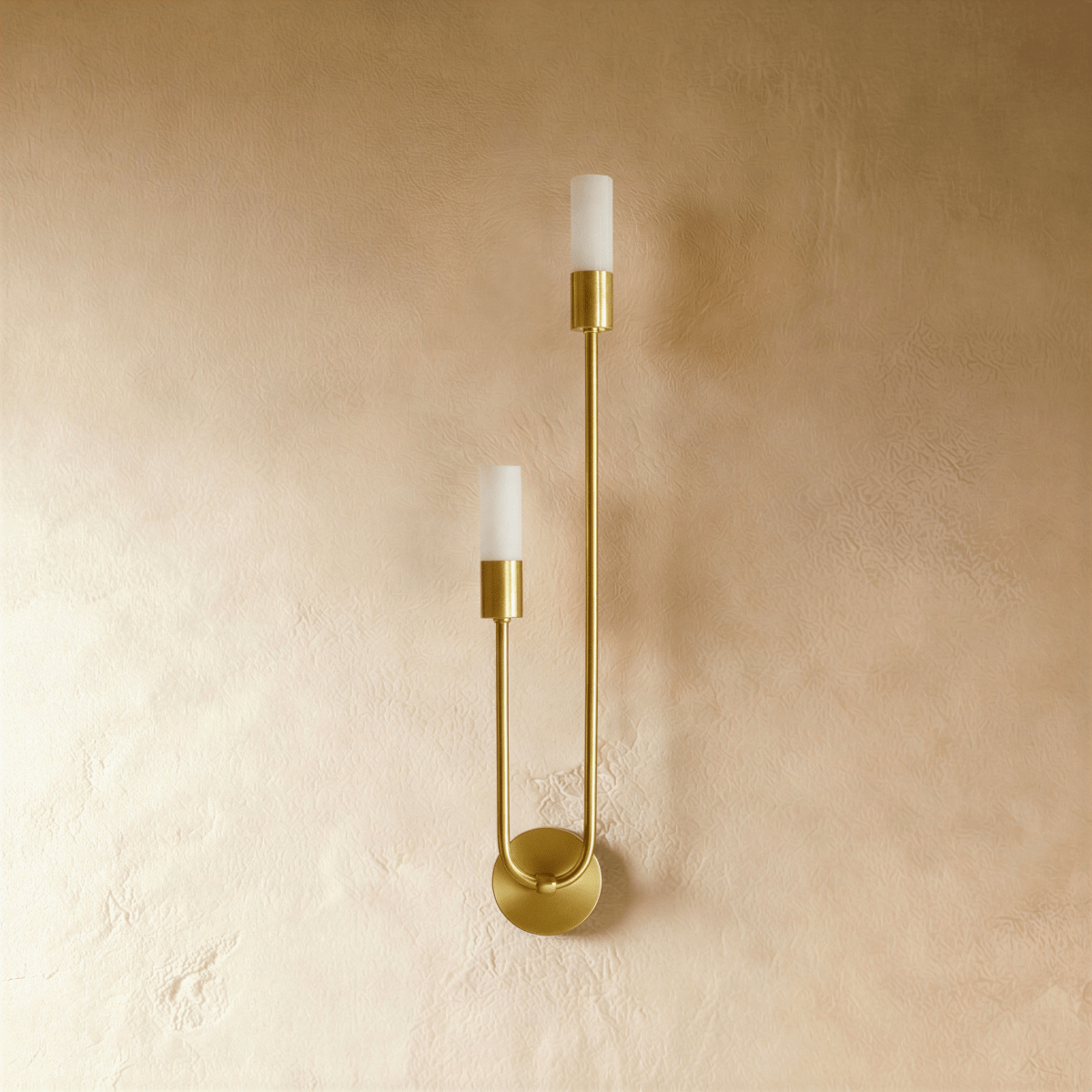 Clérachic brass wall light switched off, two frosted cylindrical diffusers on brass sockets above a round wall plate.