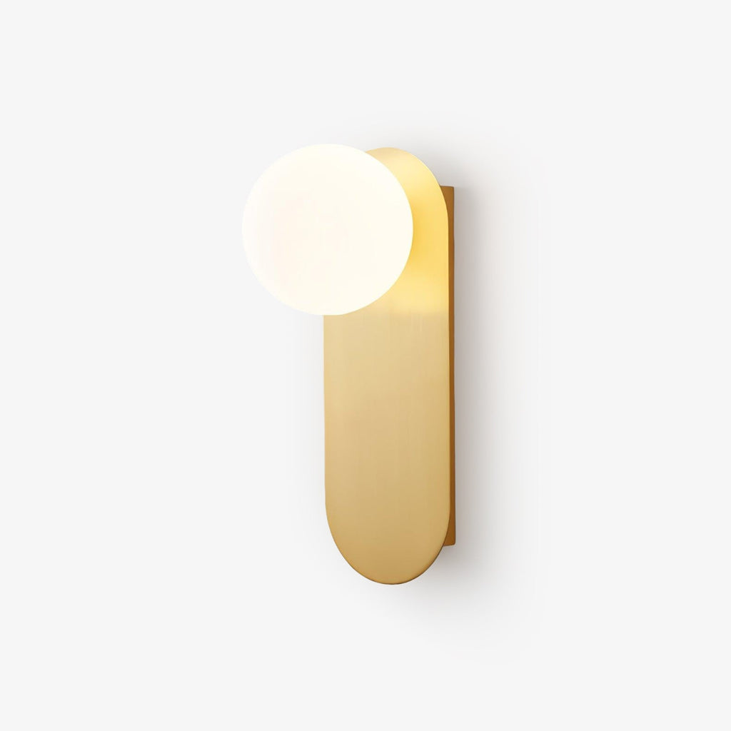 Brushed brass plate with a white glass globe on this Clérachic wall light, photographed against a soft white background.