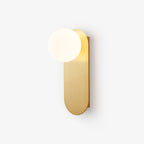 Brushed brass plate with a white glass globe on this Clérachic wall light, photographed against a soft white background.