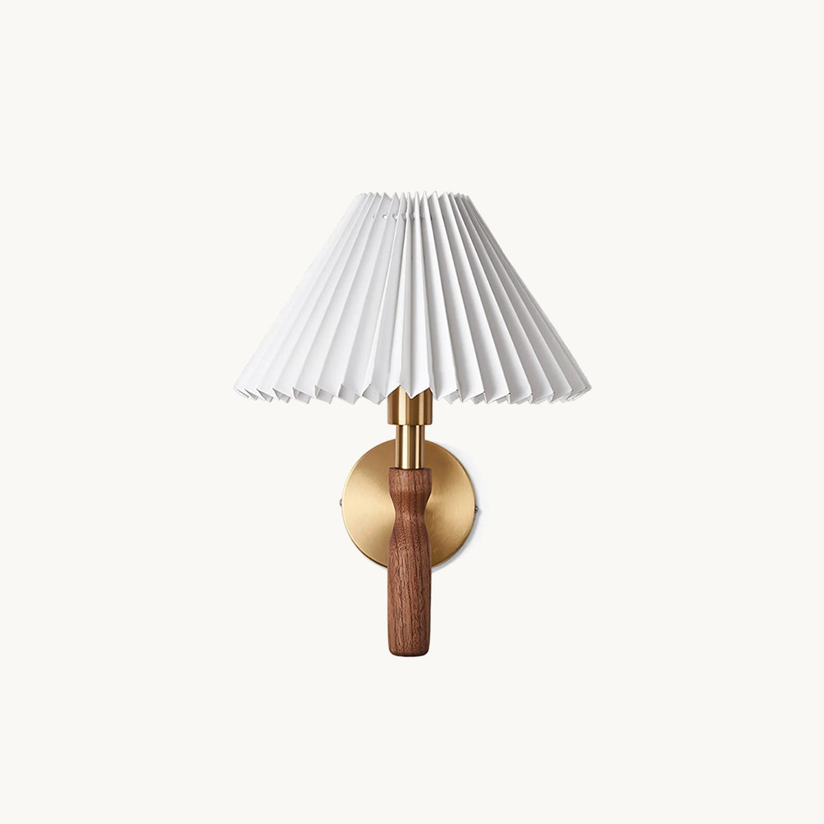 This Clérachic wall light on a plain white backdrop, a pleated white shade over a walnut handle stem and a round brass back plate.